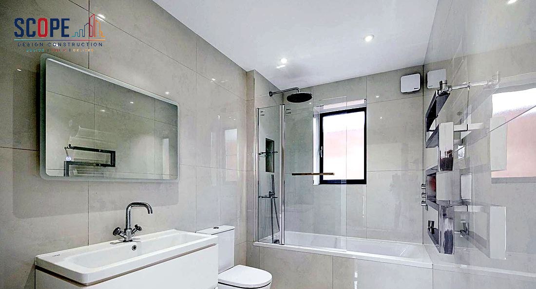 Finished modern bathroom with bath screen